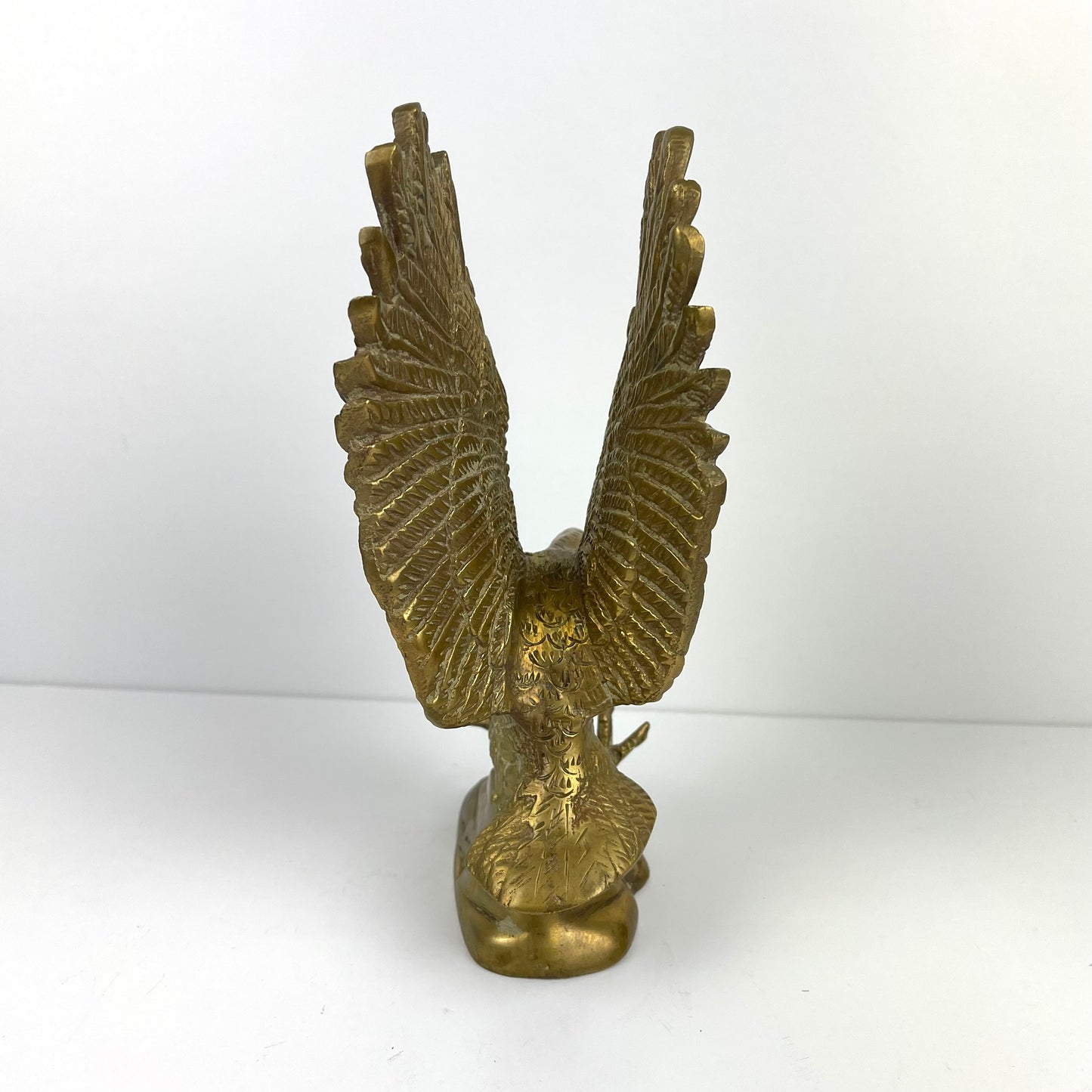 Brass eagle figurine