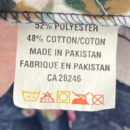 Floral print ruffle trim quilt