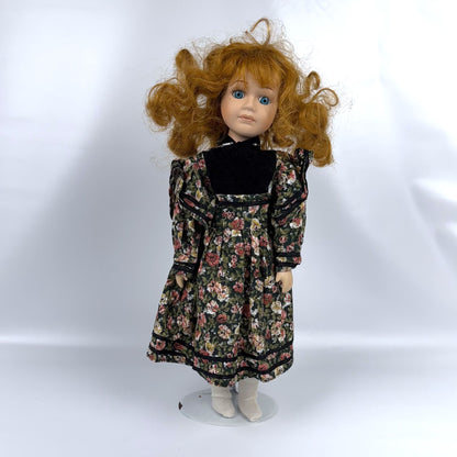 Porcelain floral dress doll