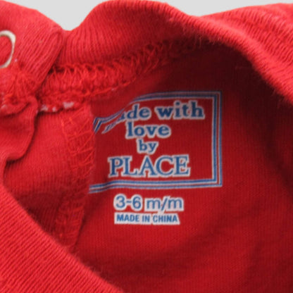 Place long sleeve onesie